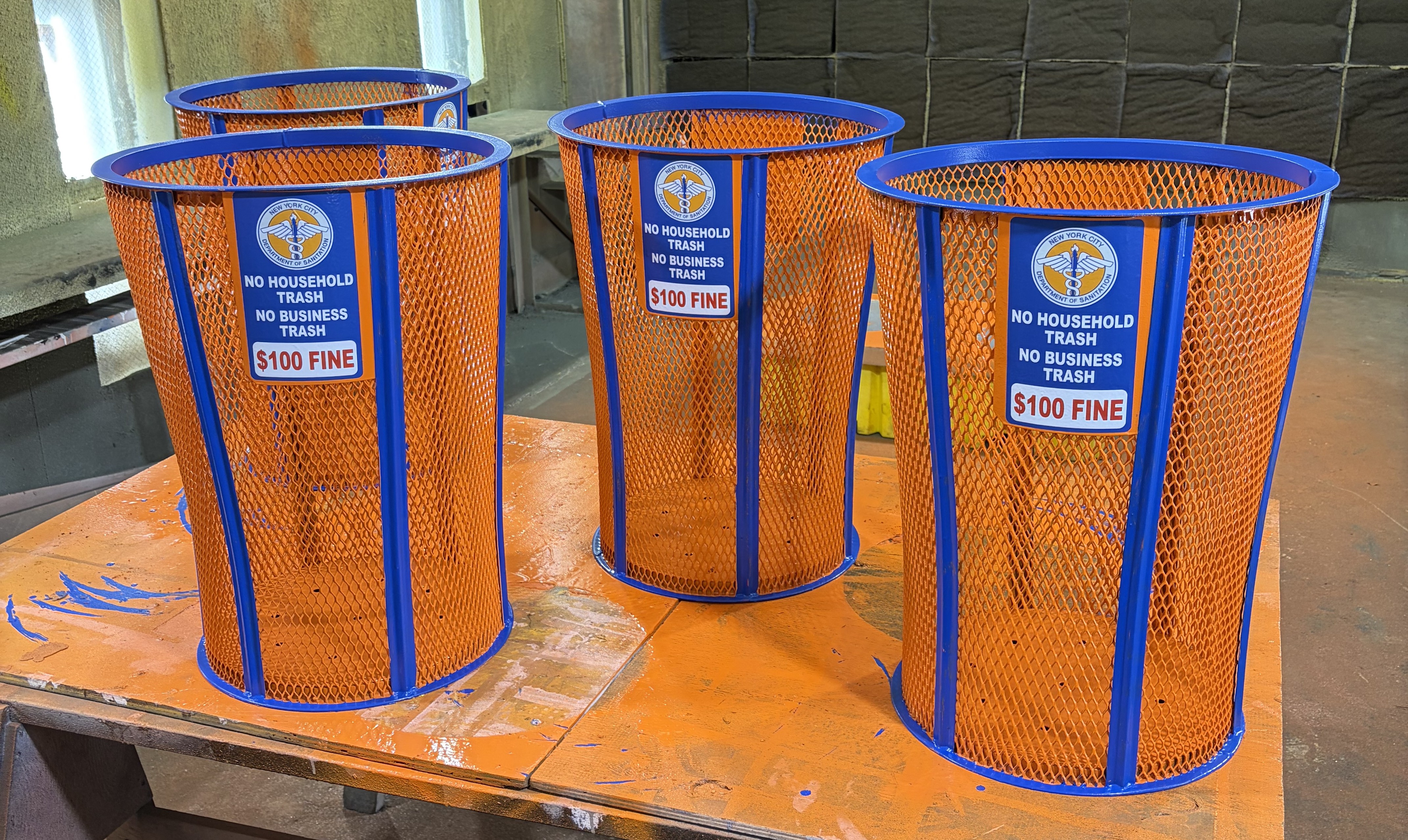 City street bins with Knicks colors.