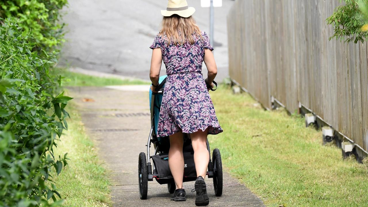 A mother pushes a stroller (file image)