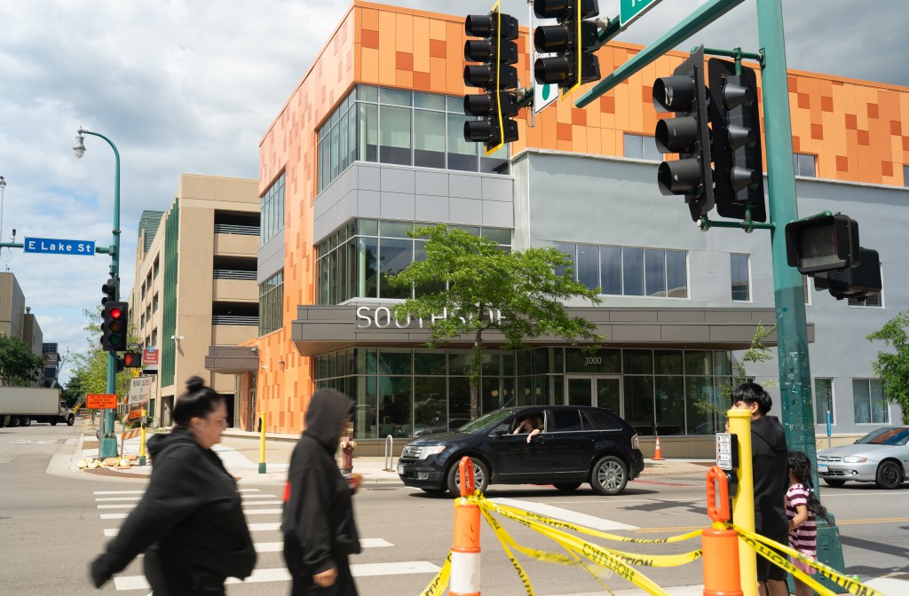 Across the street from an orange and grey building with "Southside" sign.