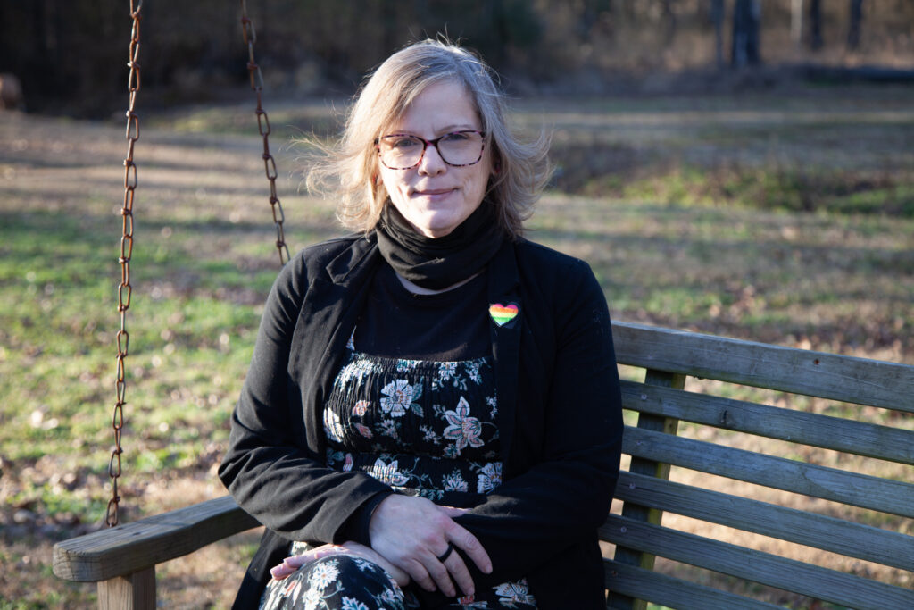Mylissa McNeill, sitting outside her home in Jacksonville, Ark., earlier this year, says she was denied prompt miscarriage care in August 2022. It was the beginning of a cascade of health problems that she blames, at least in part, on hospitalsβ reluctance to provide miscarriage management care that might run afoul of state abortion bans. (Photo by Katie Adkins/Arkansas Advocate)