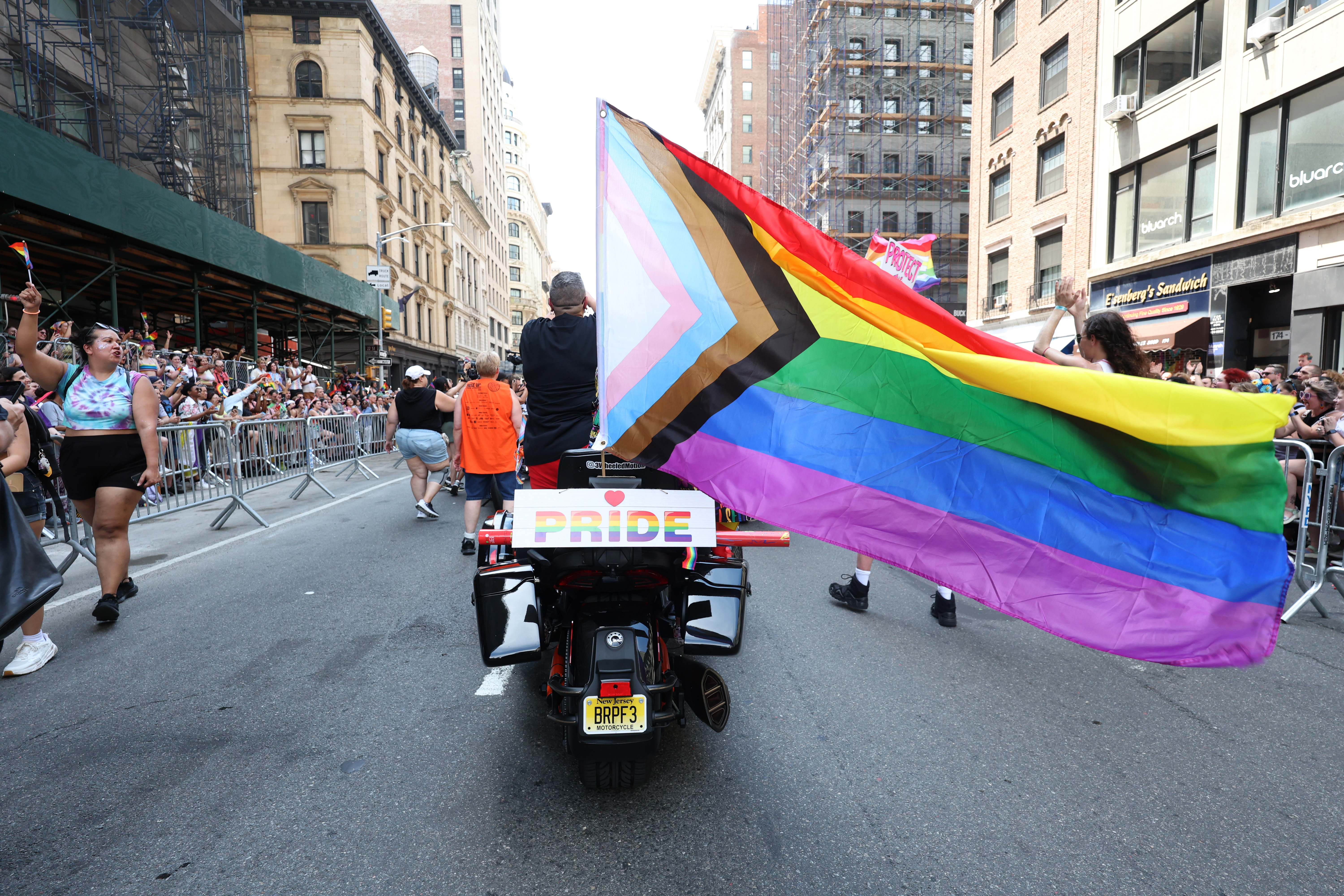 Members of the Sirens MC NYC ride down the route during the NYC Pride Parade in New York, Sunday, June 29, 2025.