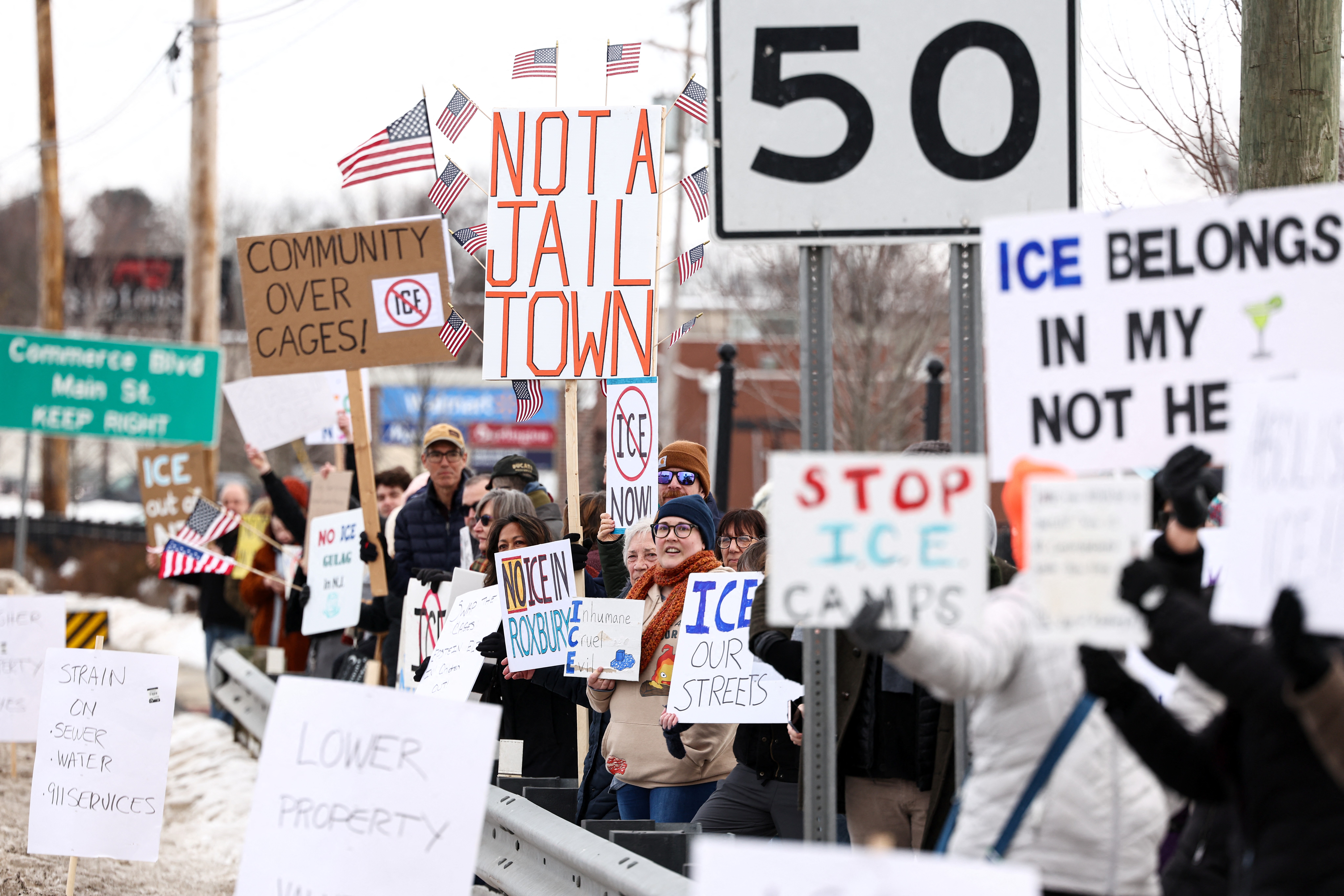 People protest against the planned project of converting a warehouse into a U.S. Immigration and Customs Enforcement detention center in Roxbury, New Jersey.