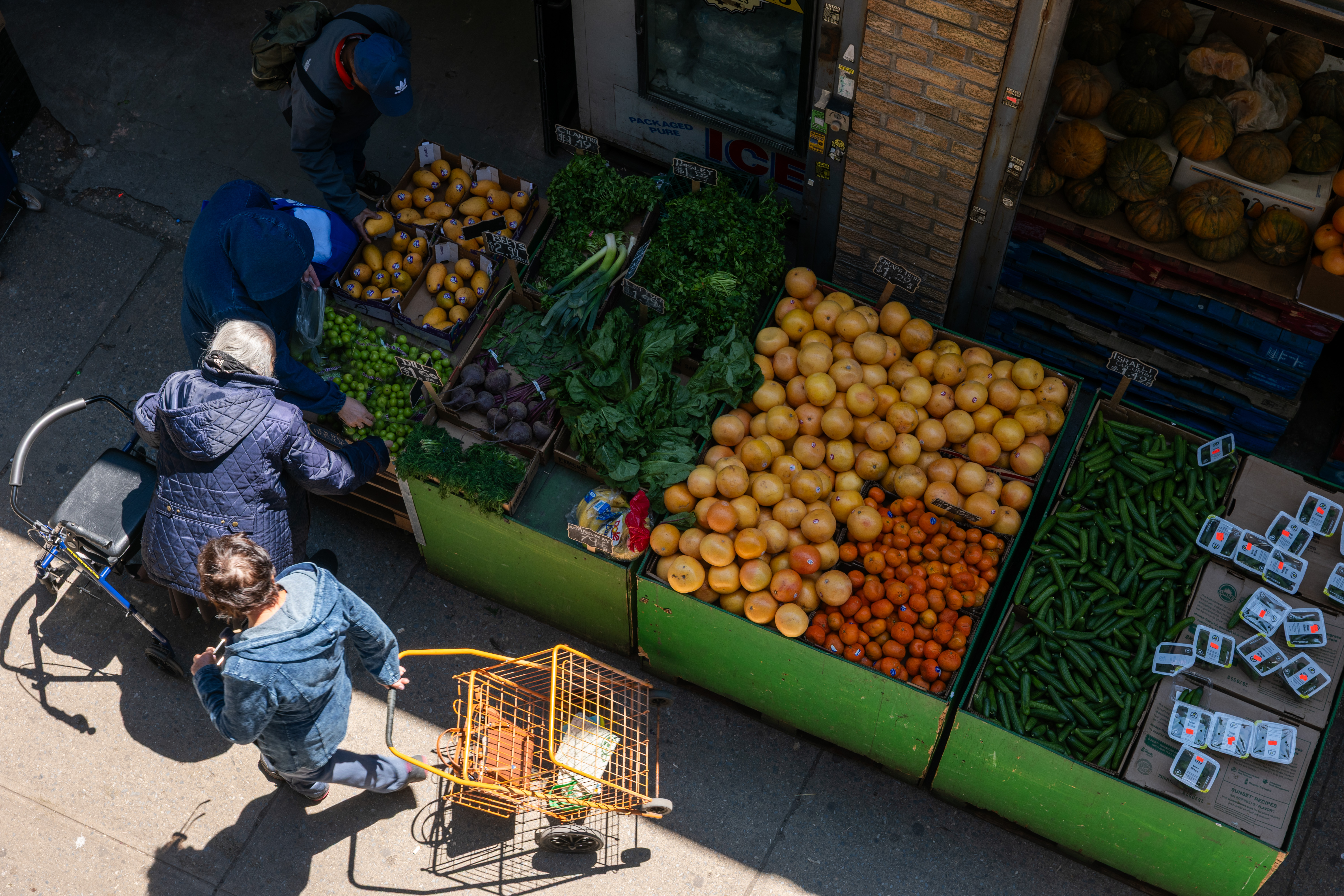 People shop for vegetables and other foods in Brighton Beach in Brooklyn on May 12, 2026, in New York City.