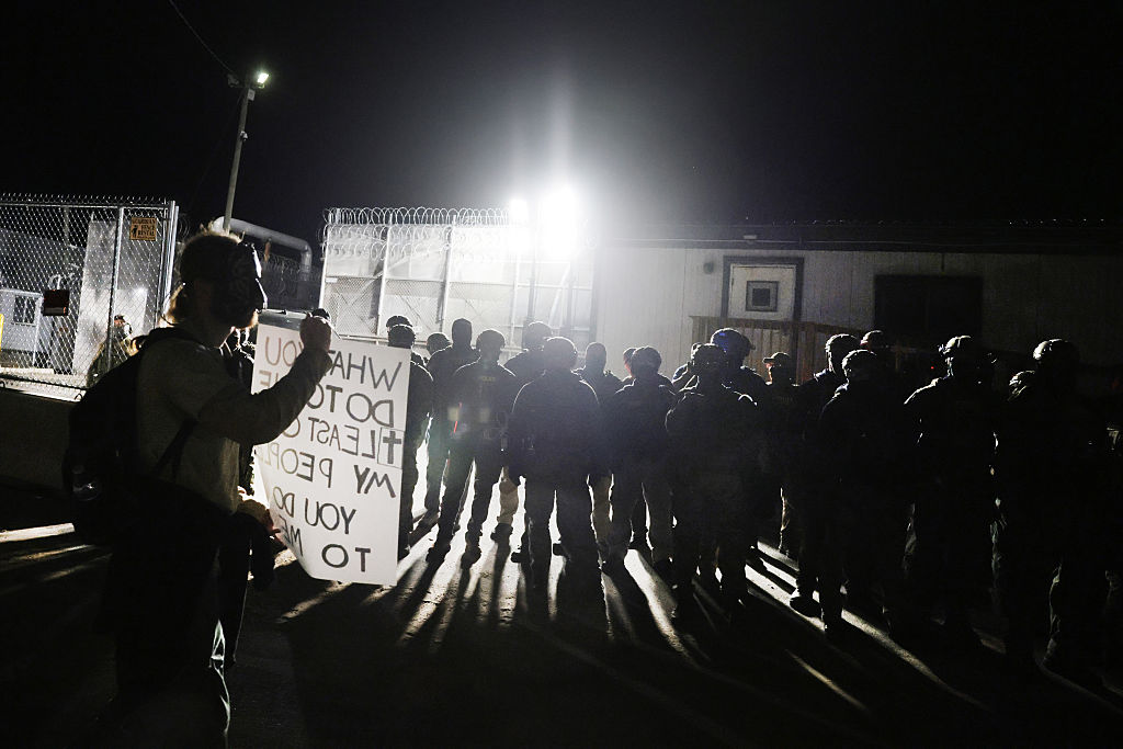 ICE agents and protesters gather on June 8, 2026, outside the federal immigration center at Delaney Hall, in Newark, New Jersey, where ICE is housing detained immigrants.