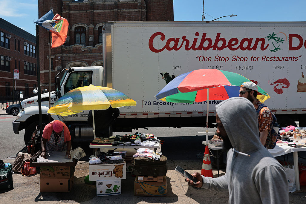 A Haitian flag flaps in the wind on June 25, 2026, in the Little Haiti neighborhood of the Brooklyn in New York City. In a 6-3 ruling, the Supreme Court ruled in favor of the Trump administration’s effort to strip temporary protected status from hundreds of thousands of Haitians and Syrians, who were legally in the U.S. and protected from deportation, including many who have lived legally in the country for years.