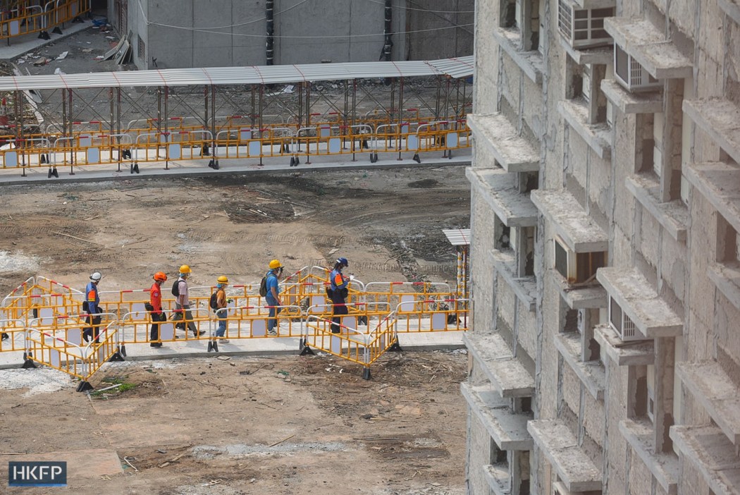 Residents collecting their belongings at Wang Sun House, Wang Fuk Court on April 20, 2026. Photo: Kyle Lam/HKFP.