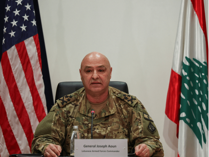 President of Lebanon, Joseph Aoun, in his army uniform with US and Lebanon flag behind him on either side