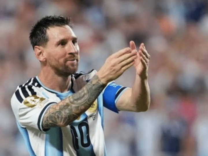 Lionel Messi during the Algeria World Cup game mid-clap