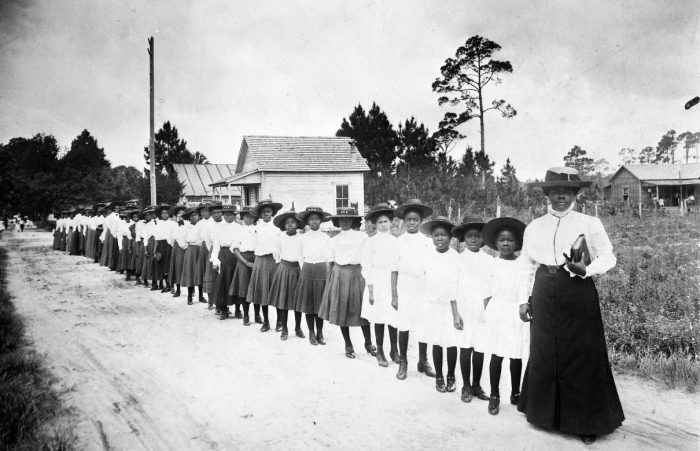 Mary McLeod Bethune, the daughter of former slaves, with a line of girls from the Daytona Normal and Industrial School for Negro Girls that she founded in Daytona Beach, Florida, 1905. (Photo courtesy of the Library of Congress)