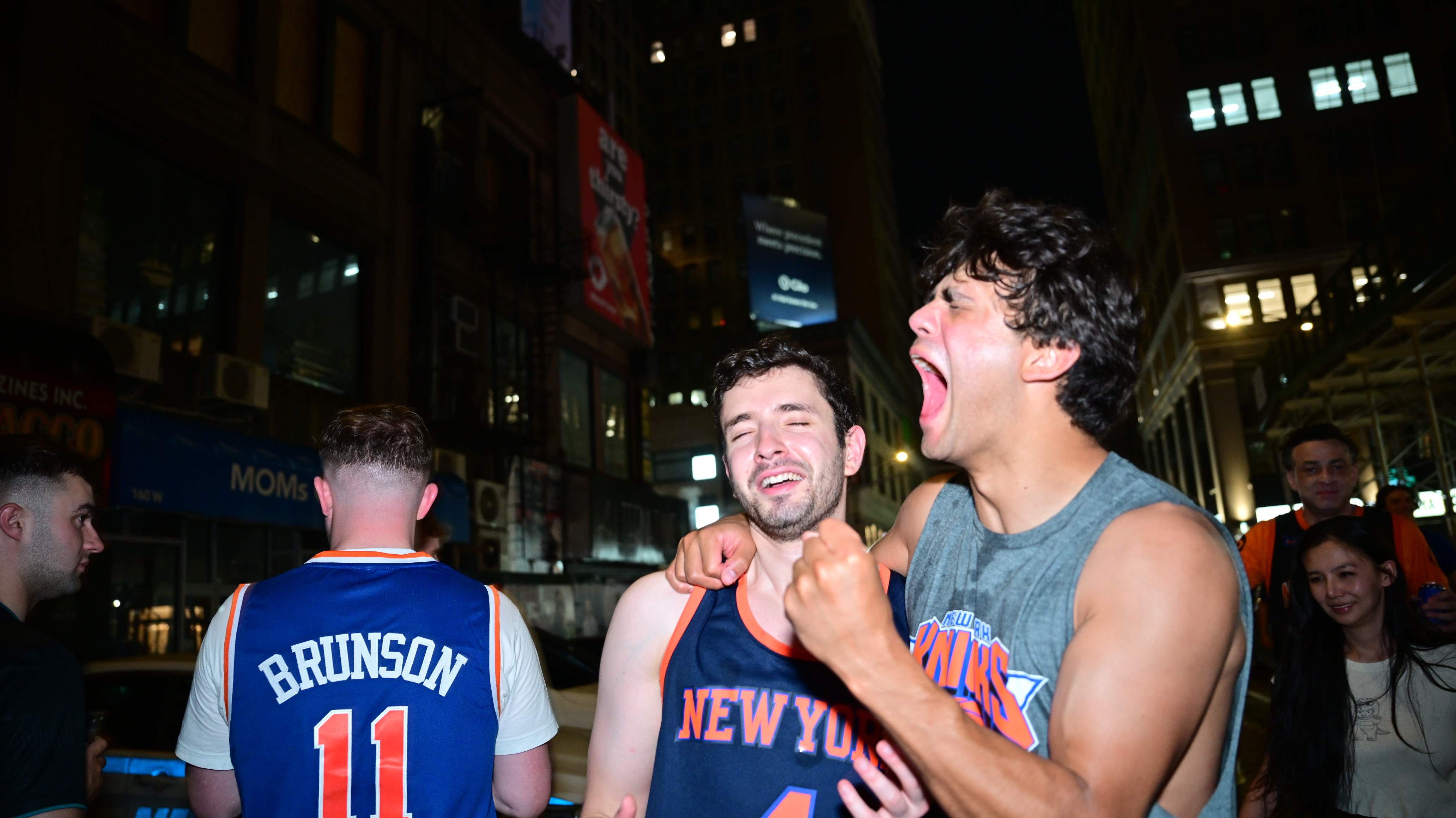 Knicks fans celebrate the team's historic win.
