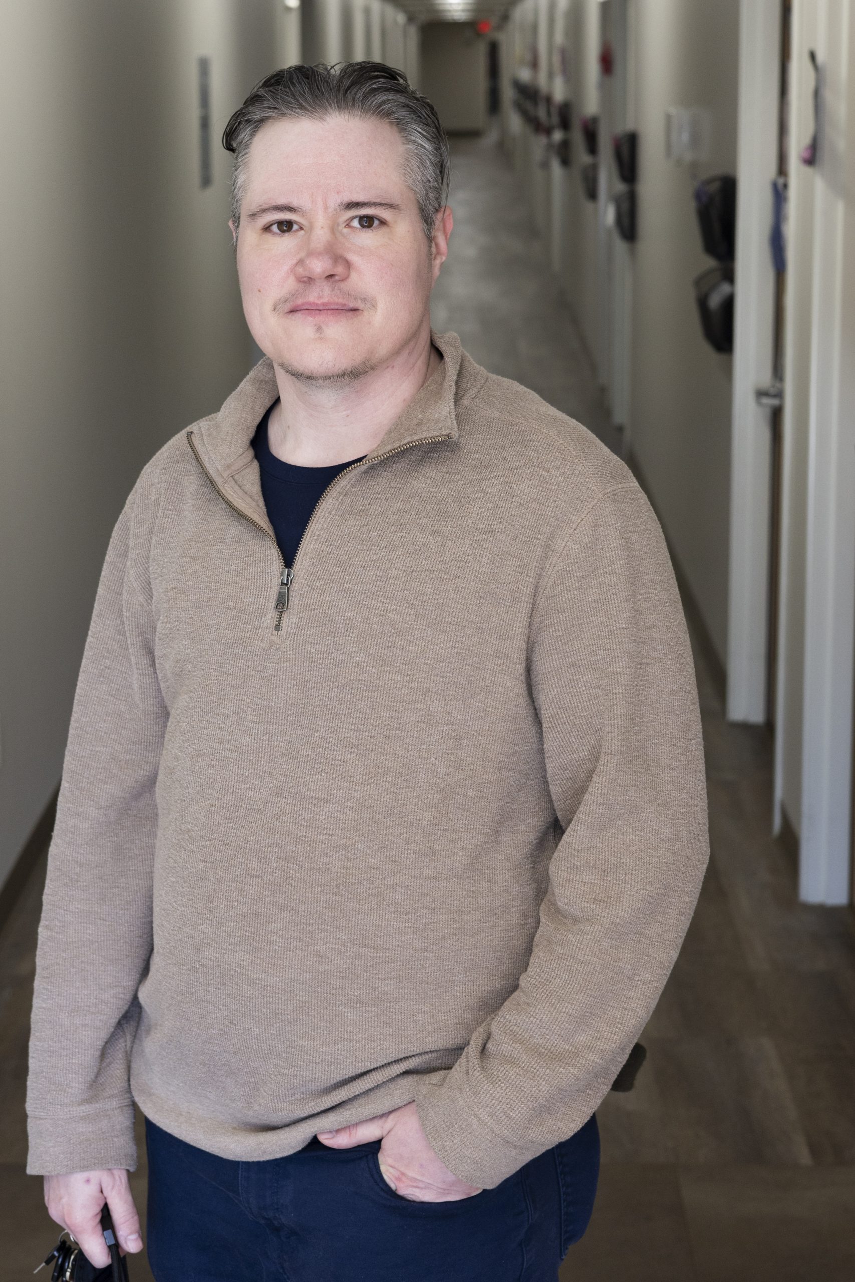 A portrait of Carmichael Finn in the hallway of the treatment center