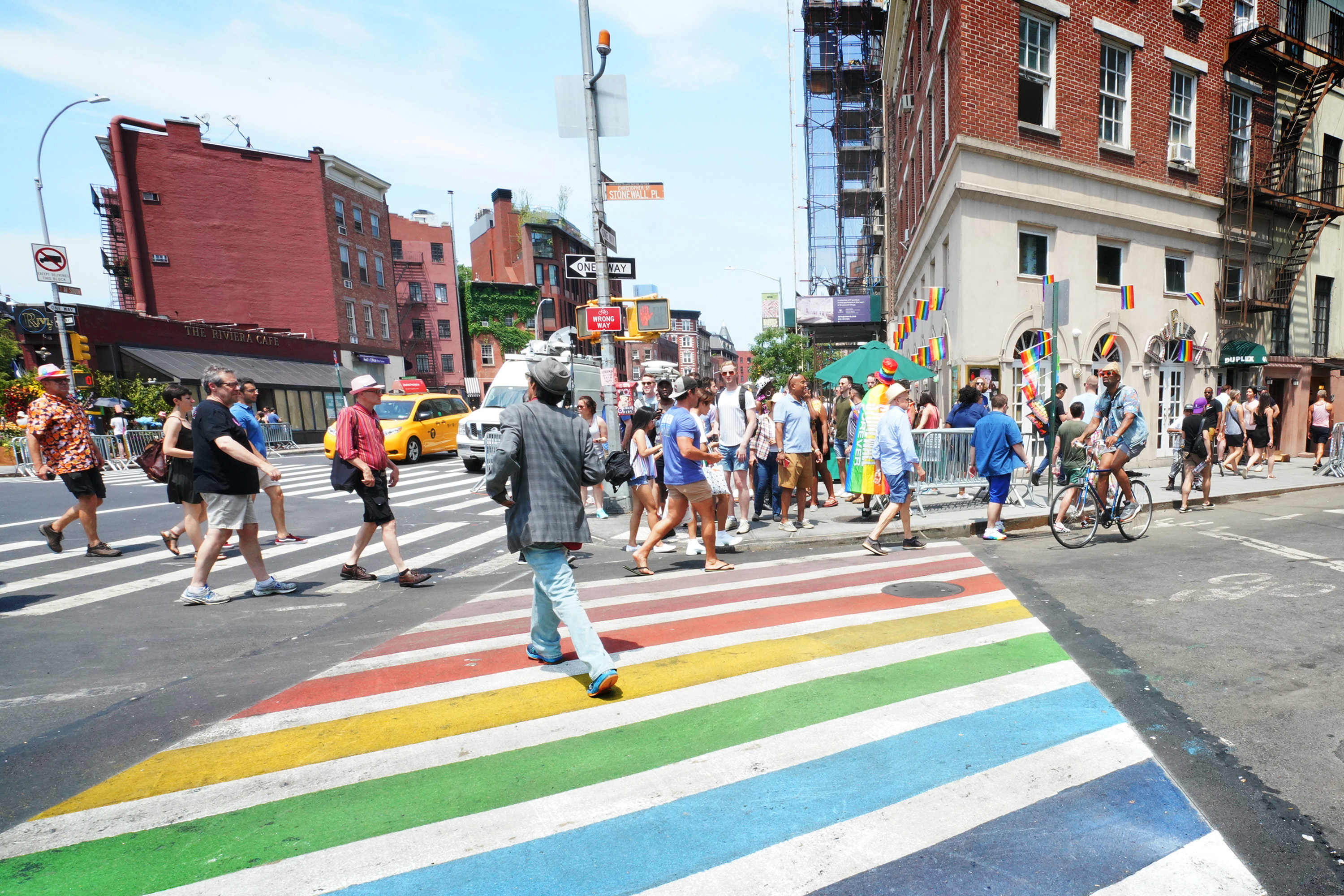 A photo of the rainbow colored crosswalk near the Stonewall Inn