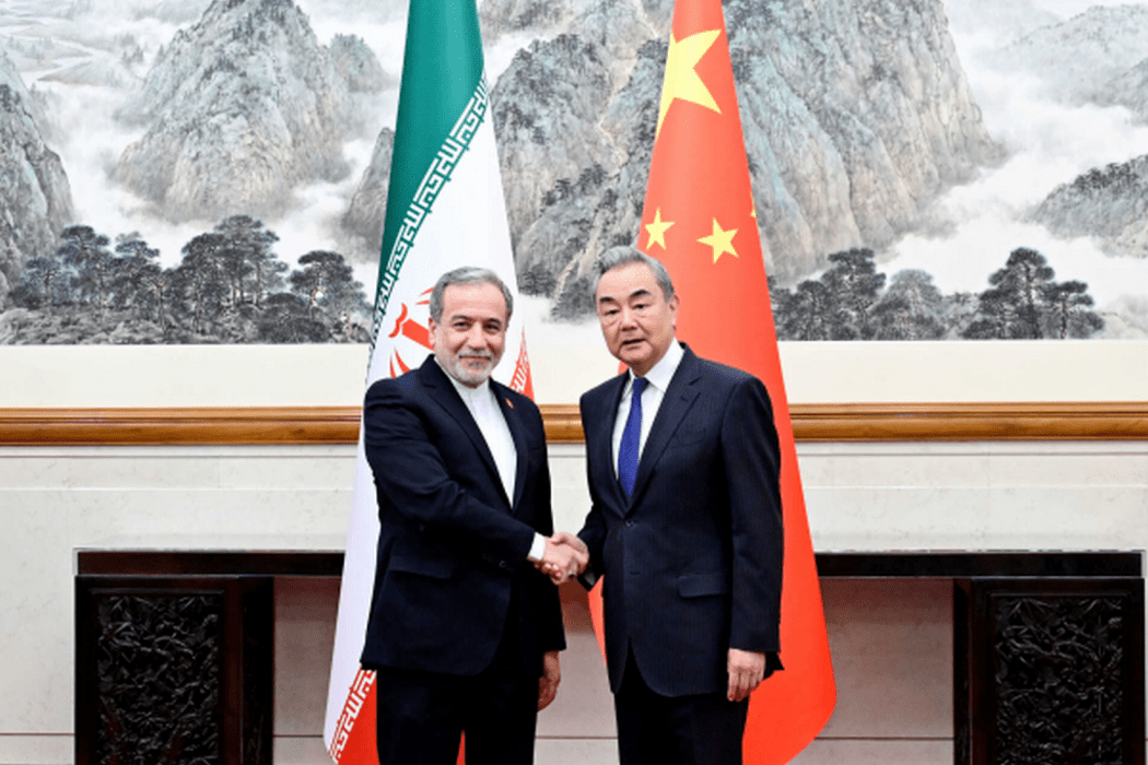 Chinese Foreign Minister Wang Yi (right) and Iranian Foreign Minister Abbas Araghchi in Beijing on May 6, 2026.