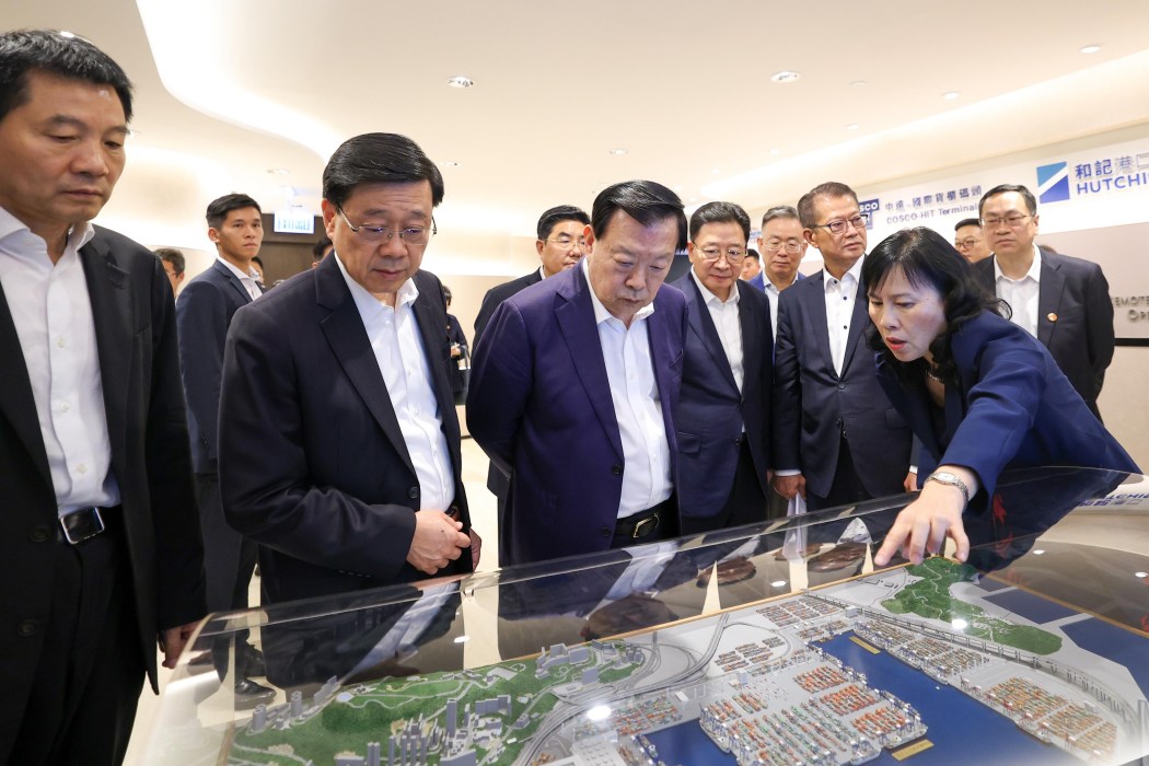 Beijing top official Xia Baolong (front row, second from right), Hong Kong Chief Executive John Lee and other officials visit the Kwai Tsing Container Terminals on June 17, 2026. Photo: GovHK.