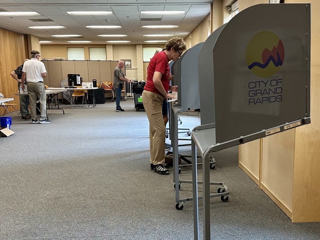 Voters in Grand Rapids, Michigan, cast their ballots during the stateβs August 2024 primary. (Photo by Matt Vasilogambros/Stateline)