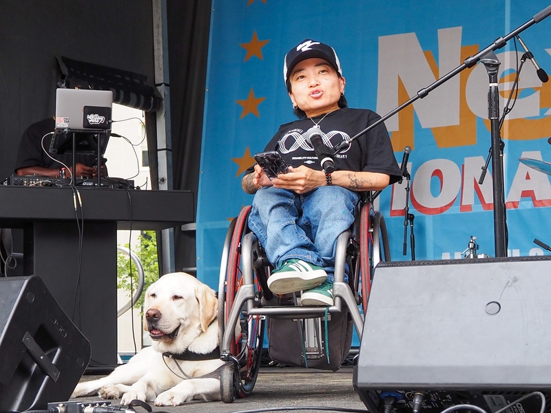 Mia Ives-Rublee, senior director for the Disability Justice Initiative at the Center for American Progress, spoke at the Next250 rally in Washington, D.C., on June 27, 2026. (Photo by Ashley Murray/States Newsroom)