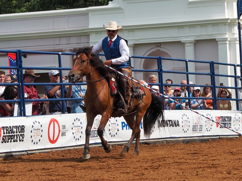 A crowd watches a rodeo on the National Mall as part of Montana's exhibit for the Freedom 250 Great American State Fair on Thursday, June 25, 2026. (Photo by Ashley Murray/States Newsroom)
