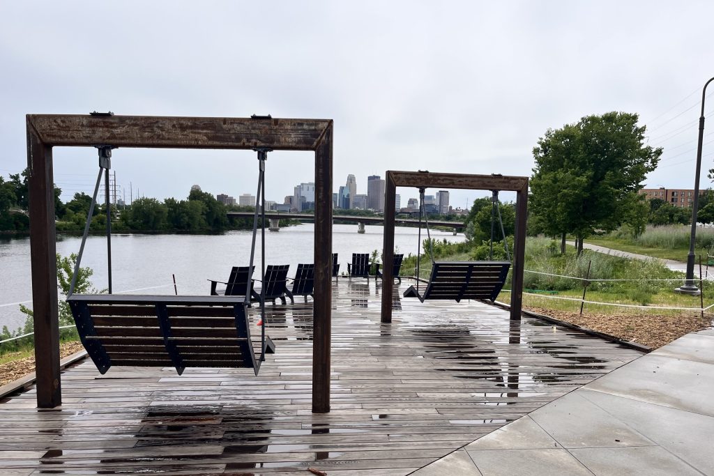 Swinging benches along a trail and riverfront