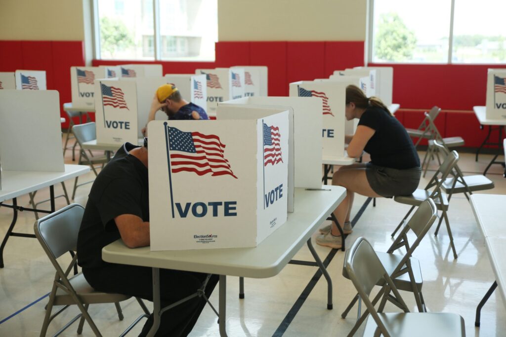 Voters fill out their ballots at a Sioux Falls polling place during the South Dakota primary election on June 2, 2026. (Photo by Makenzie Huber/South Dakota Searchlight)