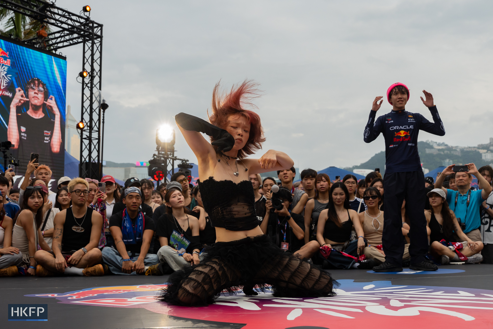 Chlorine performs on stage during Red Bull Dance Your Style competition in Tsim Sha Tsui, July 19th, 2026. Photo: Kyle Lam/HKFP.