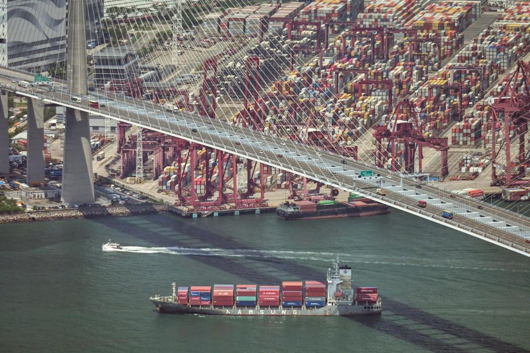 A container ship and a container terminal in Hong Kong. File photo: GovHK.