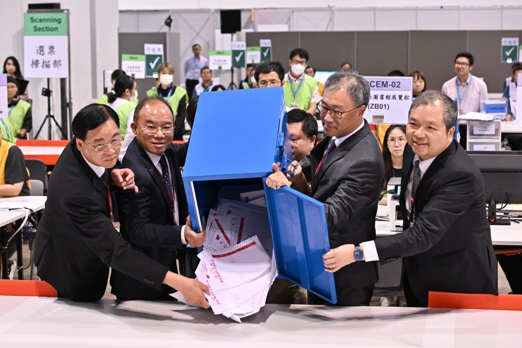 Hong Kong officials open a ballot box at the Election Committee by-elections counting station on September 7, 2025. Photo: GovHK.