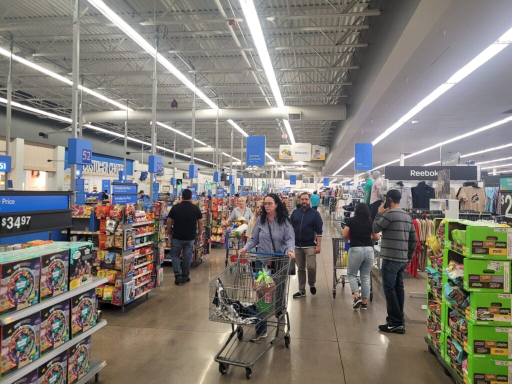 People shop for groceries at a Walmart store in Ohio. New research suggests SNAP work requirements wonβt enhance employment and will push more people off of food assistance. (Photo by Marty Schladen/Ohio Capital Journal)