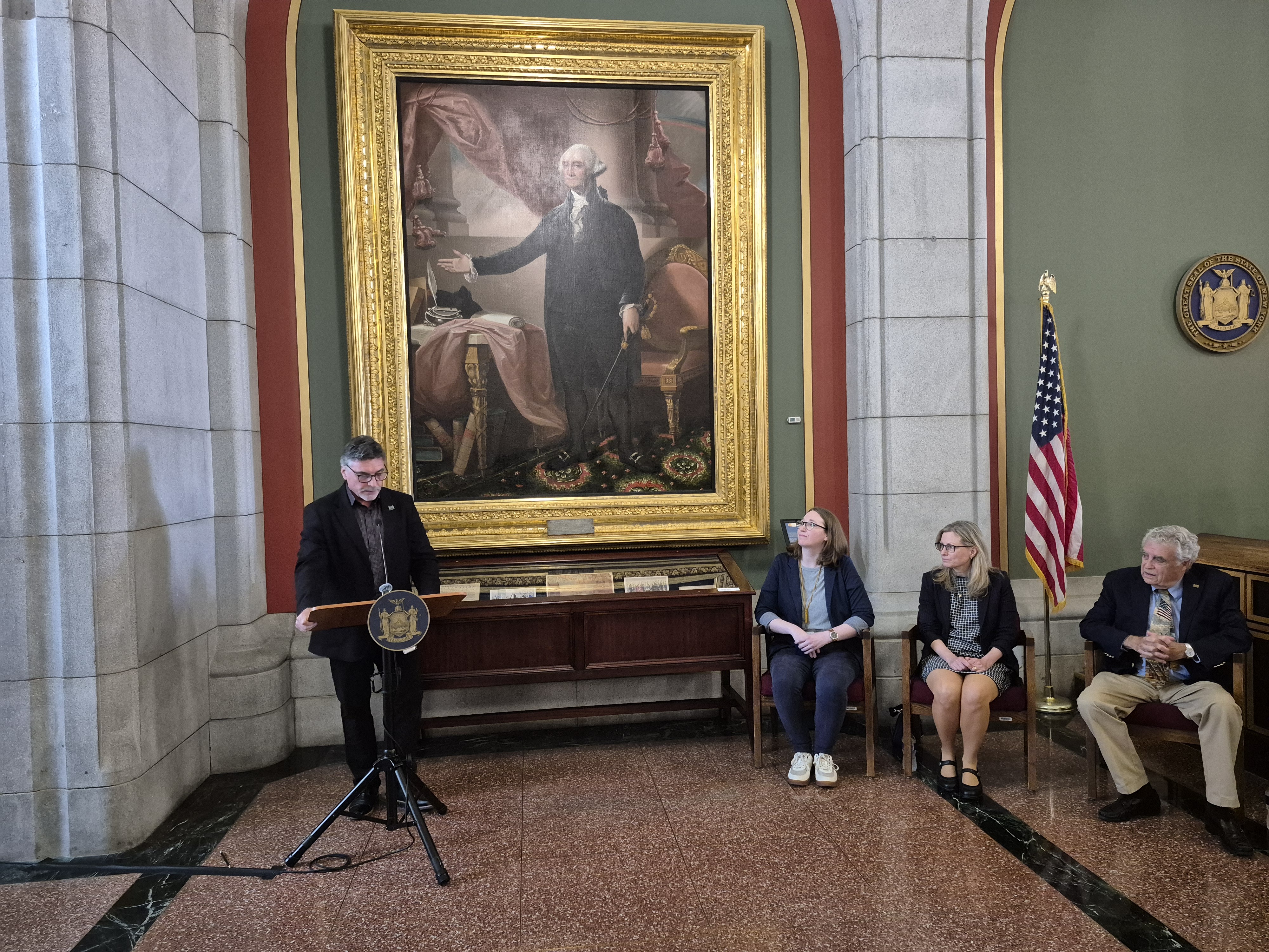 Joseph Madeira, Office of General Services director for Curatorial and Visitor Services, speaks at an event marking the restoration of the George Washington portrait on June 25, 2026.