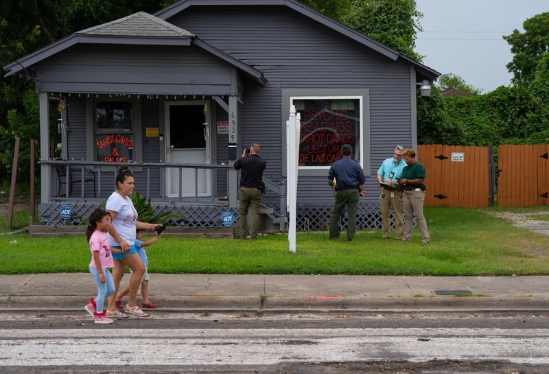 Investigators work near the Houston location of a fatal ICE shooting July 7. Statistics released July 20 show a record number of immigration arrests in June and an even higher rate in early July. (Photo by Jon Shapley/The Texas Tribune)