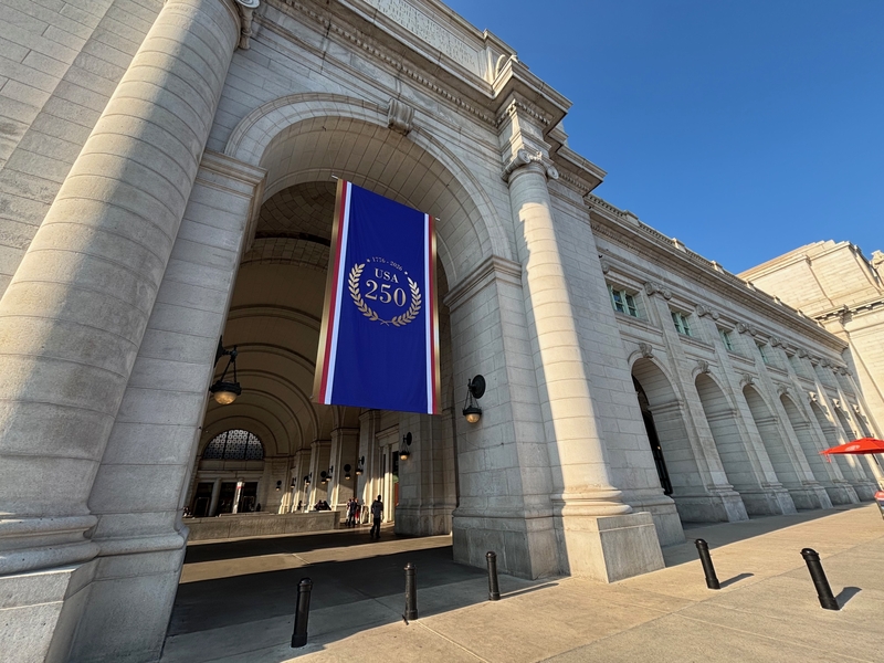 A 250th anniversary flag hangs in an entryway at Union Station in Washington, D.C., on June 29, 2026. (Photo by Jane Norman/States Newsroom)
