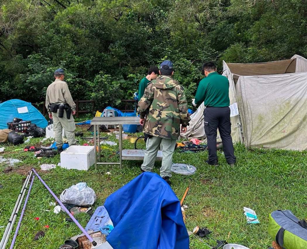 Agriculture, Fisheries and Conservation Department (AFCD) personnel clear tents and other belongings from the Wan Tsai South Campsite in Sai Kung West Country Park in July 2026. Photo: Agriculture, Fisheries and Conservation Department, via Facebook.