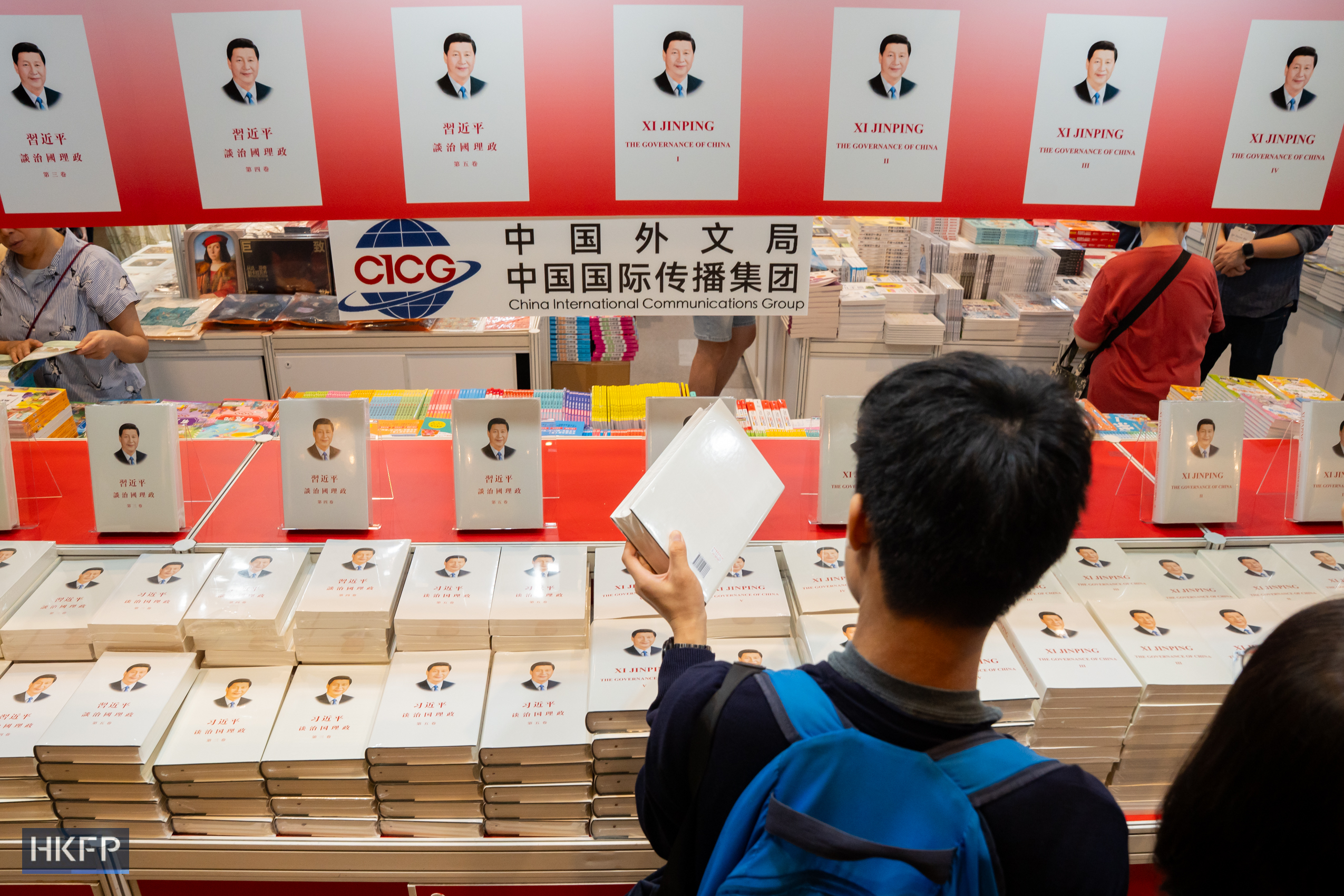 A booth at the Hong Kong Book Fair in Hong Kong Convention and Exhibition Centre in Wan Chai, displays a five-volume collection of speeches and writings by Chinese President Xi Jinping on the governance of China, on July 15th, 2026. Photo: Kyle Lam/HKFP.