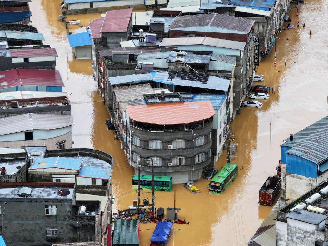 An aerial view shows flooding in Pingshan village at Xiaoyi town in Hengzhou, China's southern Guangxi region, on July 6, 2026. Photo: CNS/AFP.