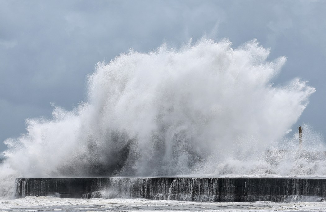 Strong waves break along the coast in Yilan on July 10, 2026, as Typhoon Bavi moves toward Northeastern Taiwan.