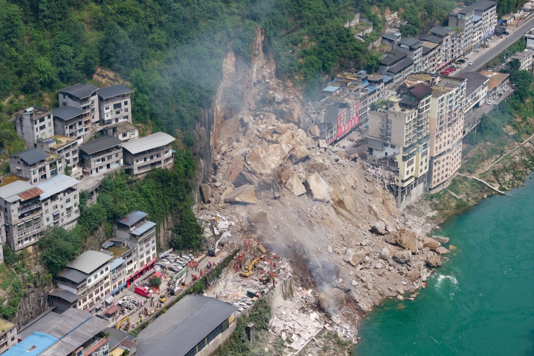 Rescue workers search for survivors at the site of a landslide in Pengshui County in Chongqing, China on July 17, 2026. Photo: CNS/AFP/China OUT.