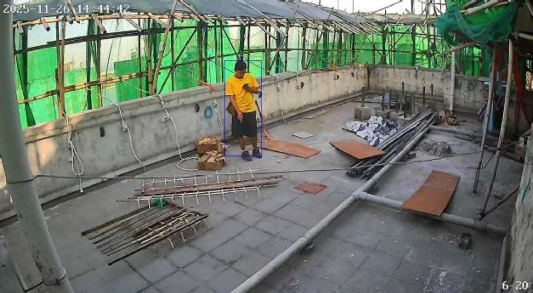 A worker on the roof of Wang Cheong House, the first building to catch fire at Wang Fuk Court, on the day of the fire, dated November 26, 2025. Photo: CCTV footage via Wang Fuk Court independent committee.