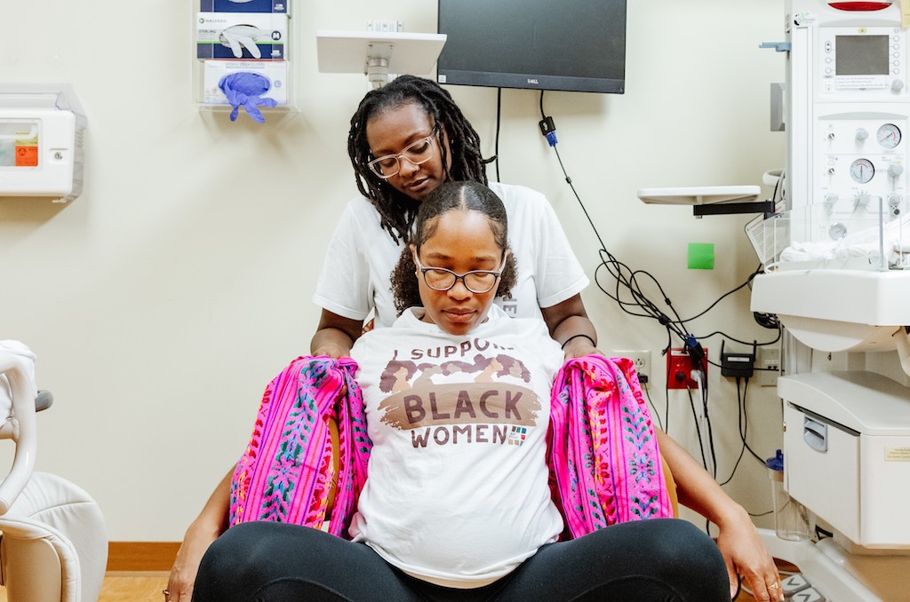Doulas participate in a simulation training session. The Trump administration recently proposed to rescind a requirement that certain employers report the demographics of their workforce. (Photo courtesy of Kenda Sutton-El/Birth in Color)