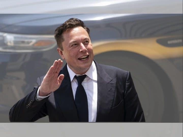 Elon Musk waving