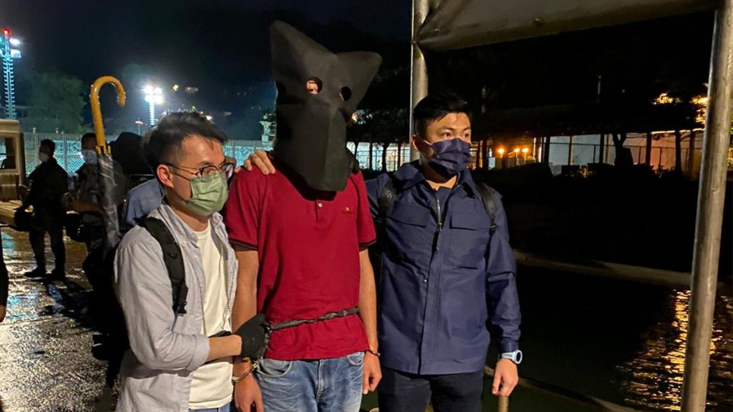 Hong Kong police arresting Matthew Choi, who was suspected in the stabbing of a taxi driver, on October 13, 2021. Photo: Hong Kong Police Force, via X.