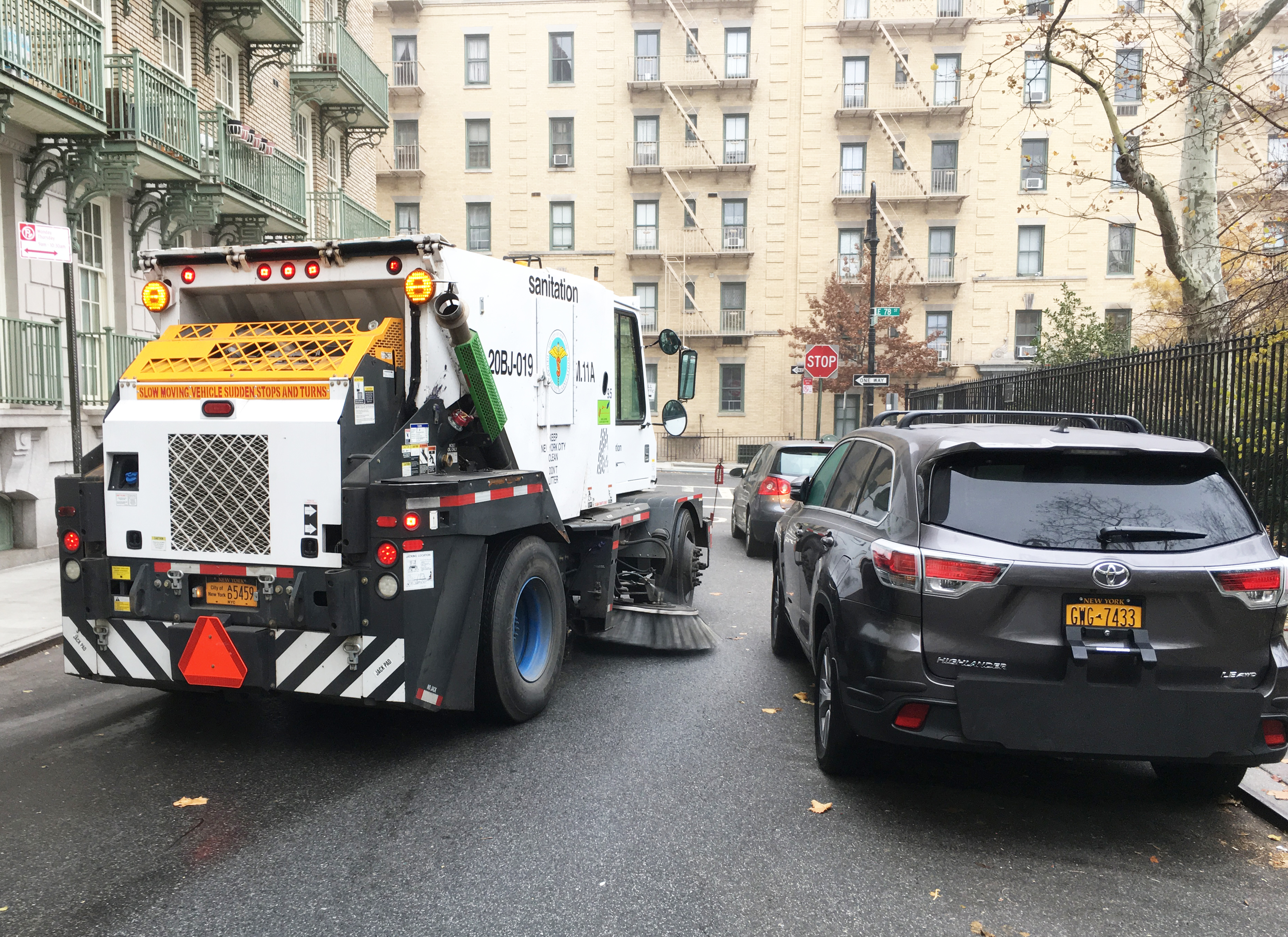 A street sweeper on an NYC street.