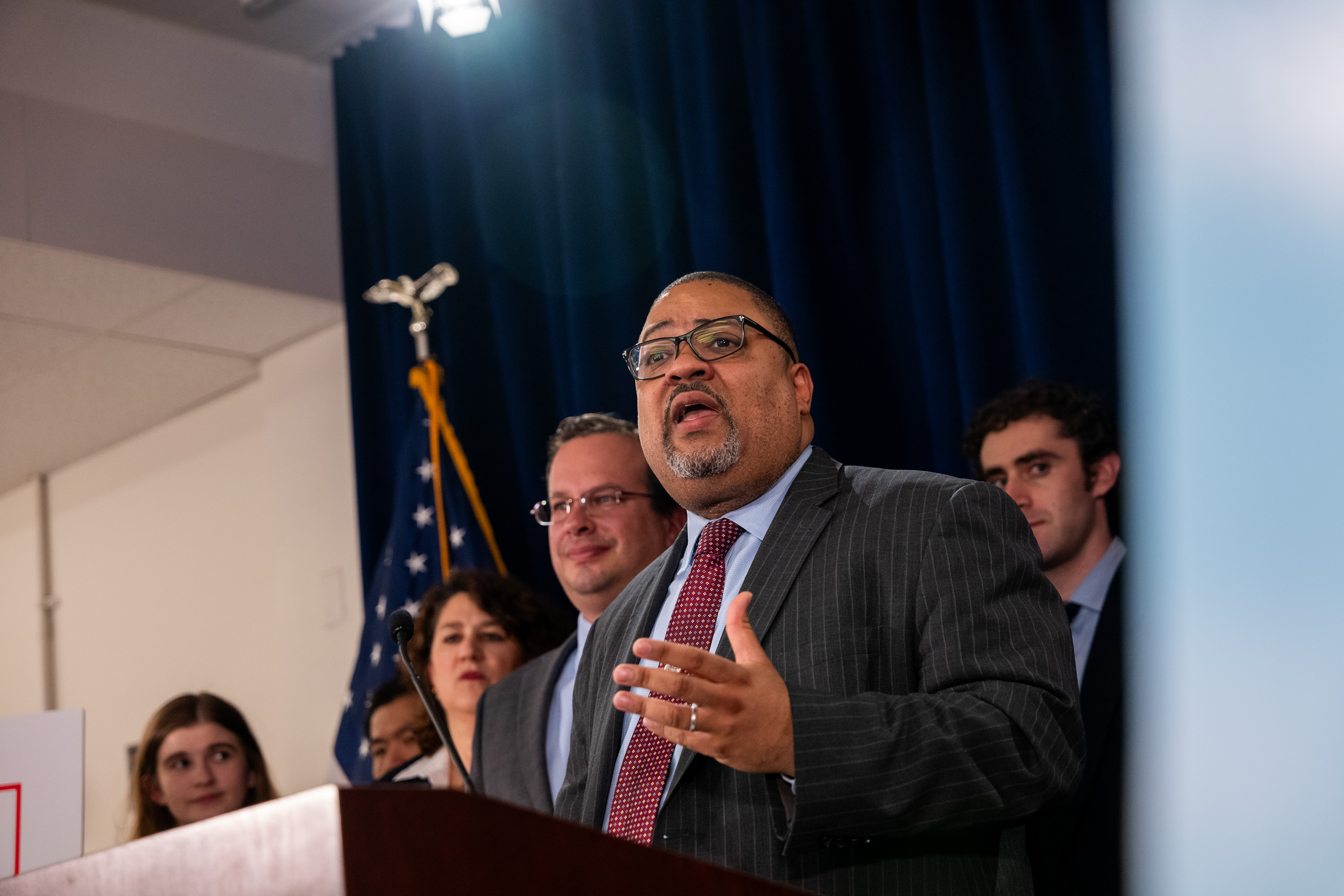 Manhattan District Attorney Alvin Bragg stands with members of his staff at a news conference following the conviction of former U.S. President Donald Trump in his hush money trial on May 30, 2024 in New York City.