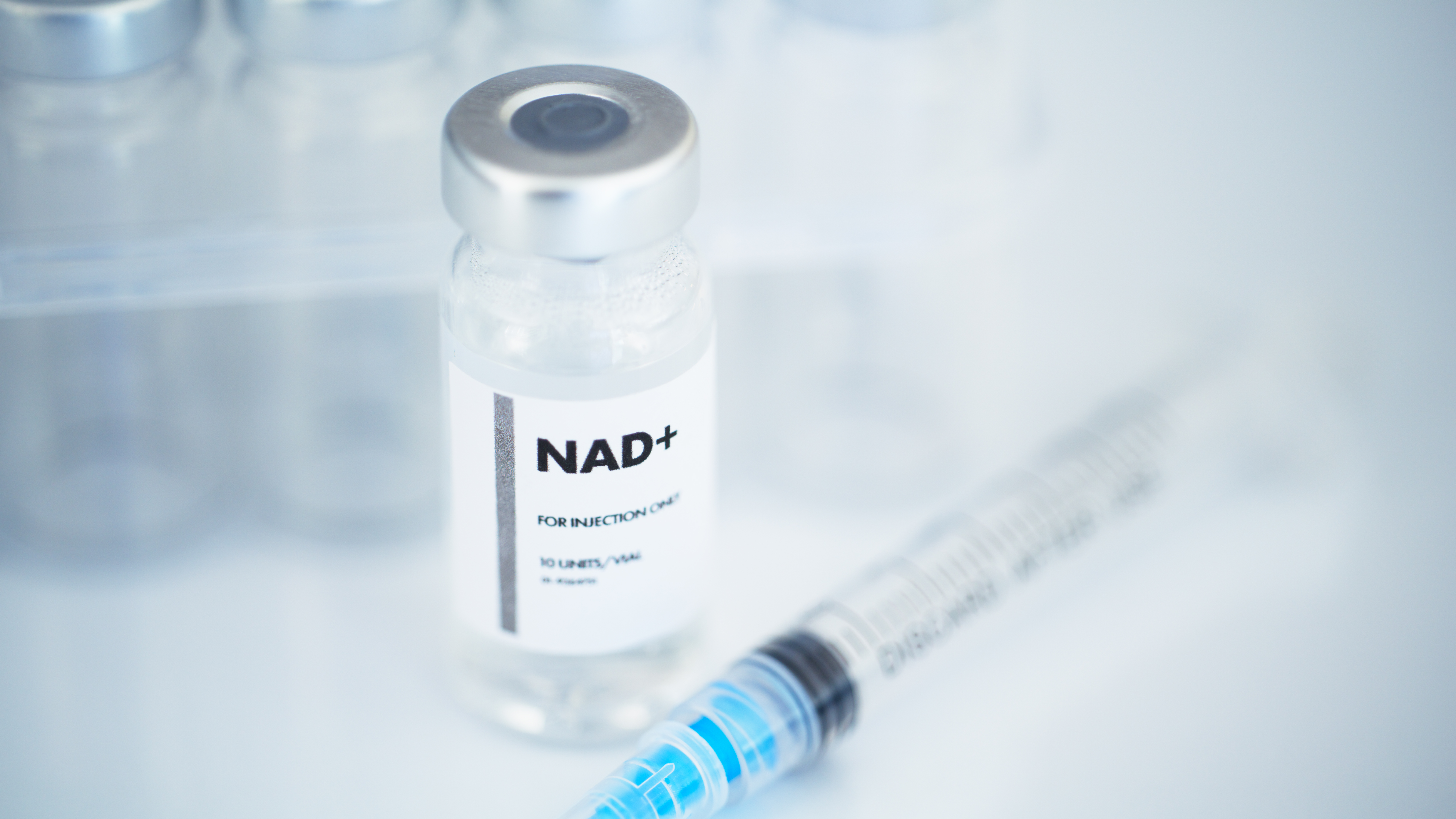 NAD+ Peptide in a vaccine vial with Syringe
