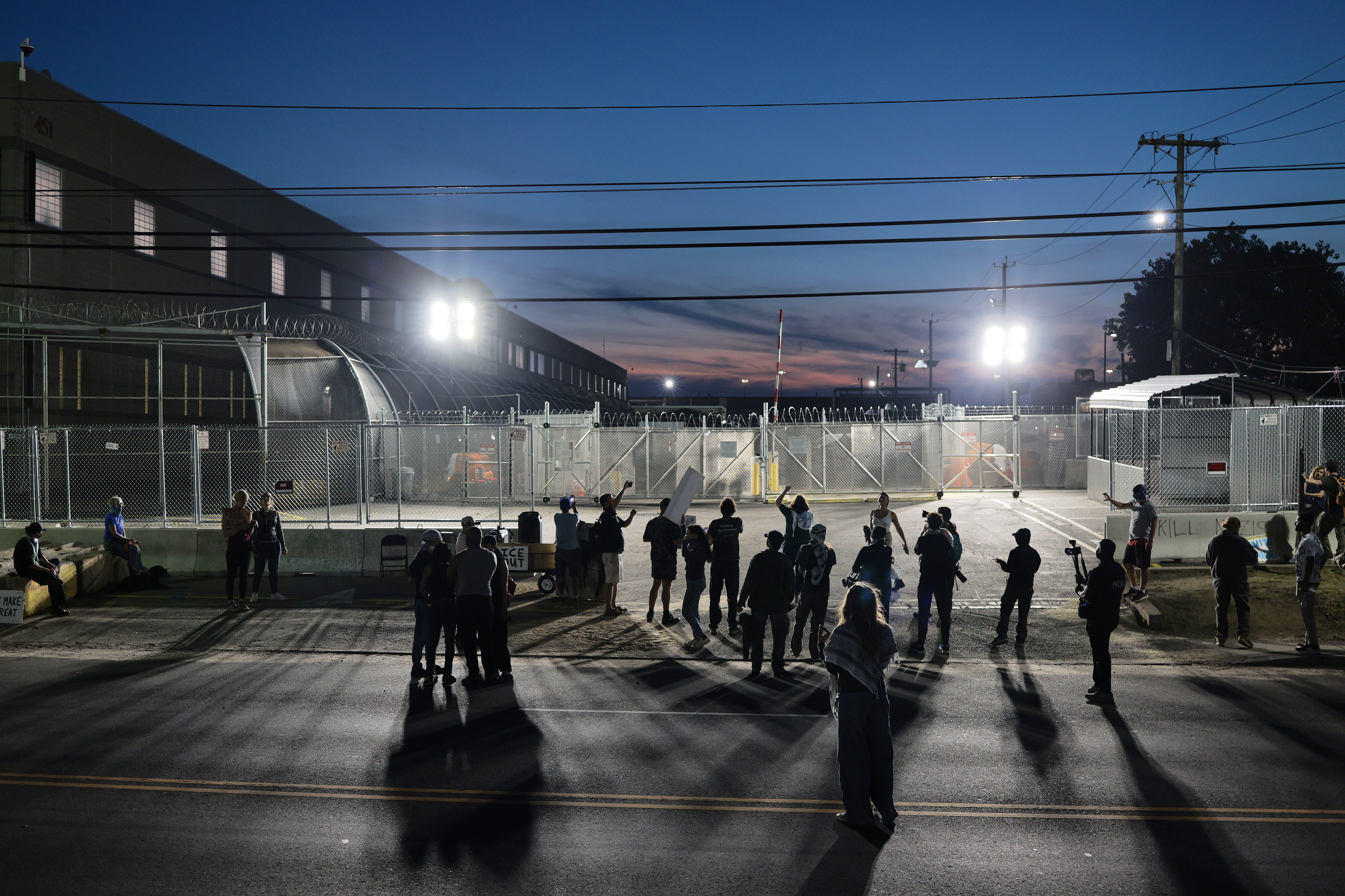 Protesters gather outside the Delaney Hall Immigration Detention Center on June 09
