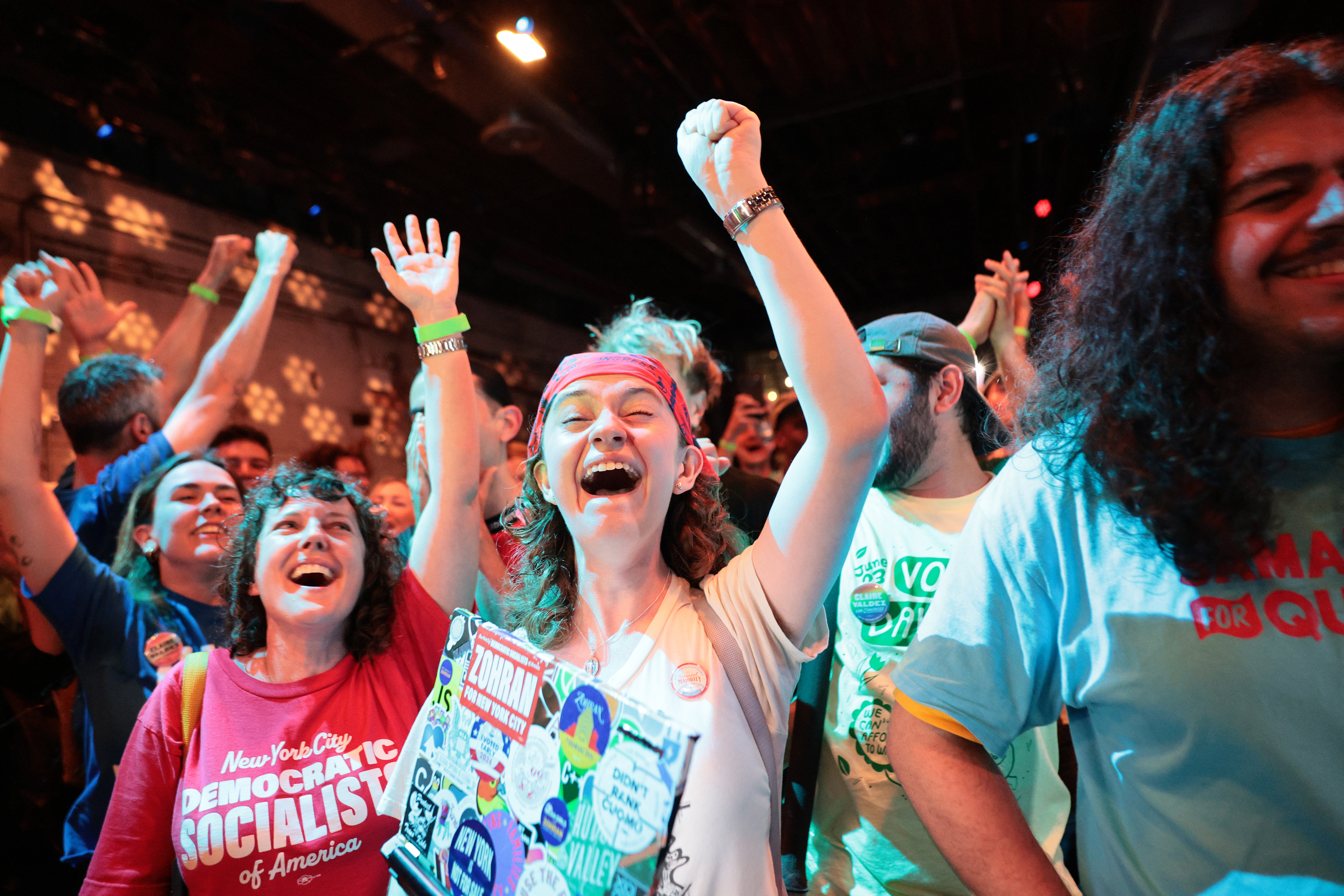 Supporters of NYC Congressional Candidate Claire Valdez celebrate as she is announced the winner of her race during her primary night watch party