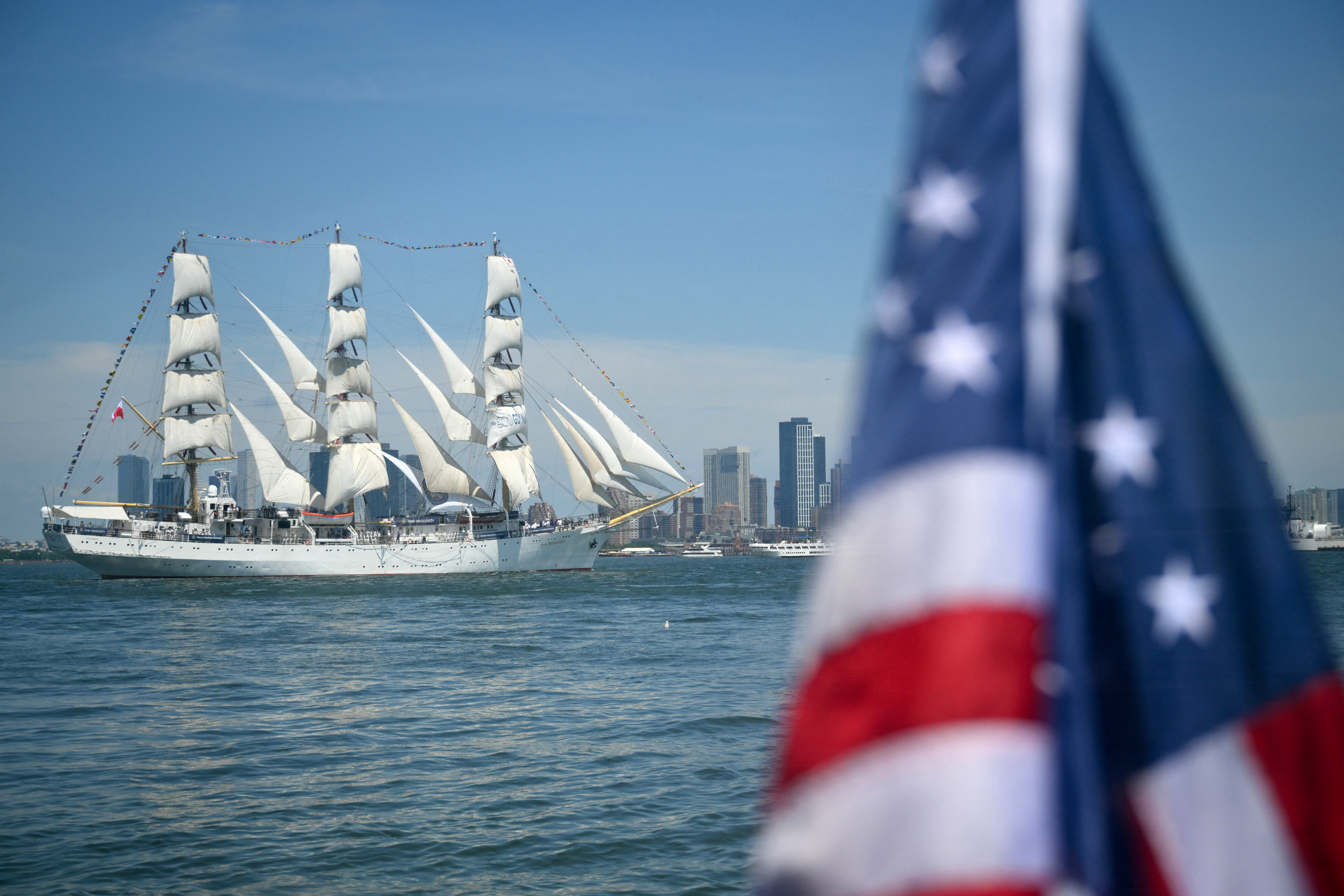 Polish merchant navy training ship Dar Mlodziezy sails past in New York harbor during the Sail4th 250 Parade of Ships in New York City on July 4