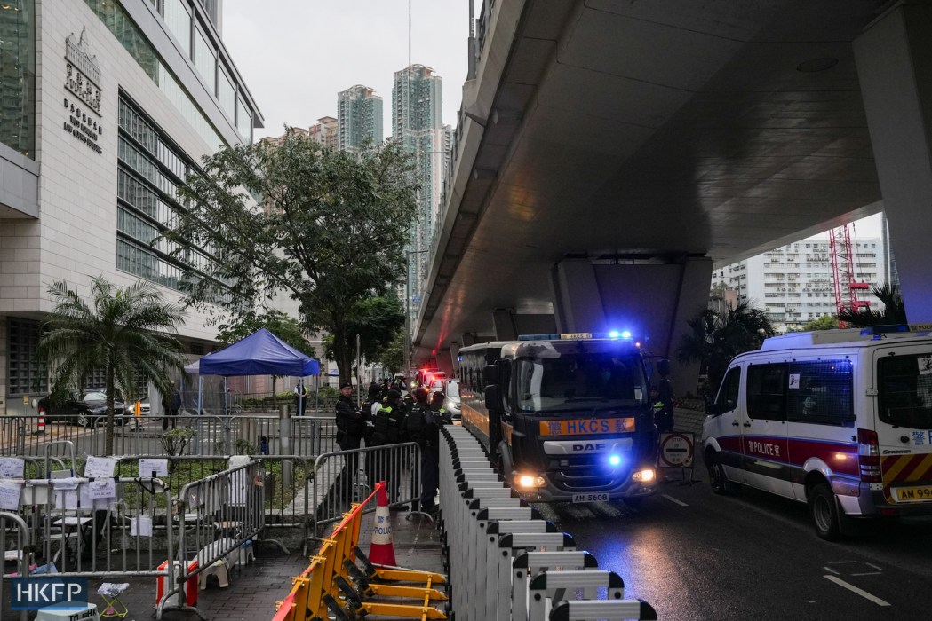 A Correctional Services Vehicle leaves West Kowloon Law Courts Building on November 19, 2024, after 45 pro-democracy figures were sentenced to up to 10 years in jail. Photo: Kyle Lam/HKFp.
