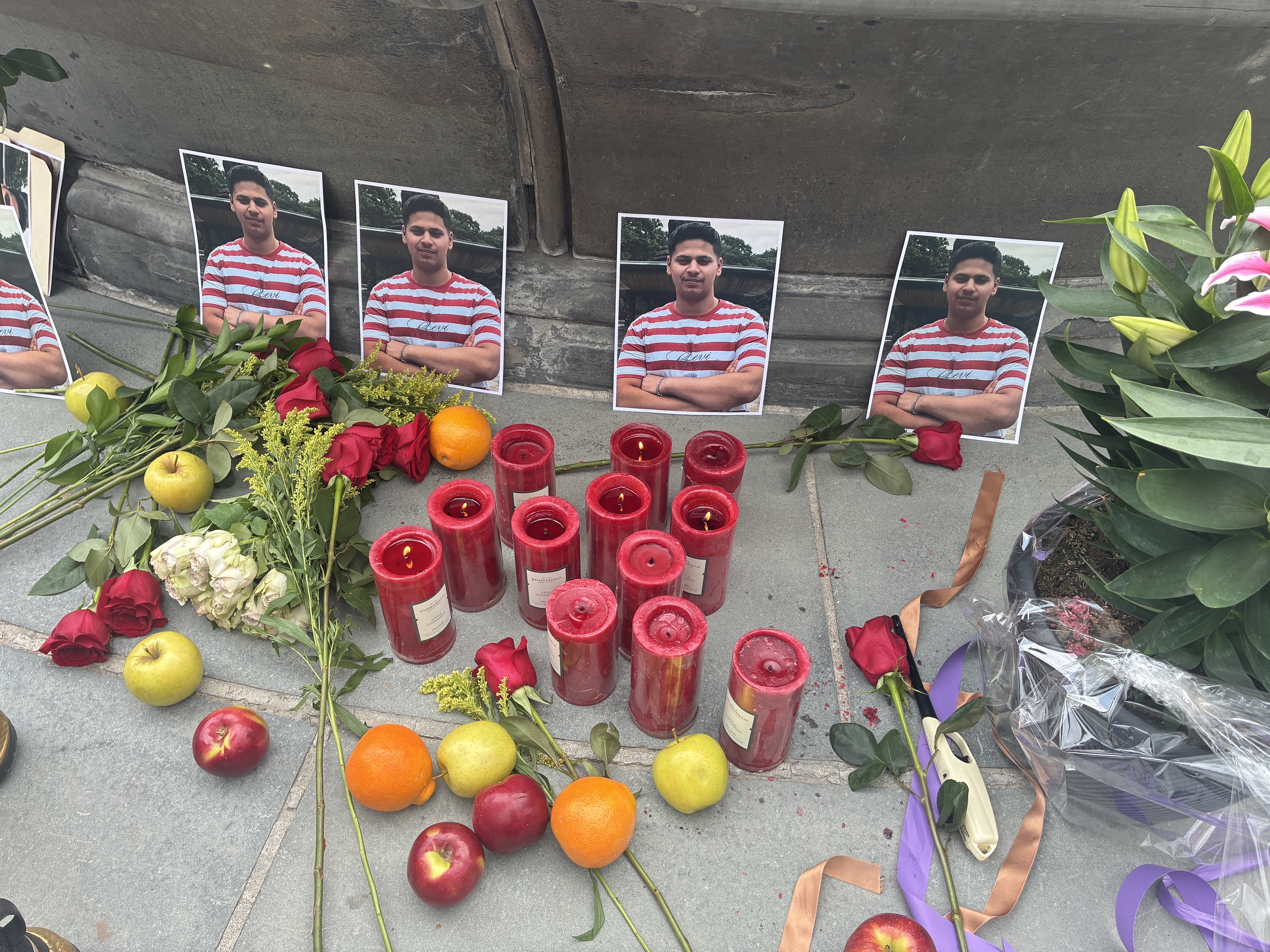 A vigil was set up for Romanch Mahajan next to Central Park's Cherry Hill Fountain on July 27.