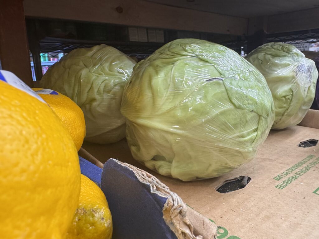 Salad greens for sale at a bodega in Astoria, New York. The number of cases of cyclosporiasis has more than doubled to over 4,173 cases across 41 states this week. (Photo by Shalina Chatlani/ Stateline)