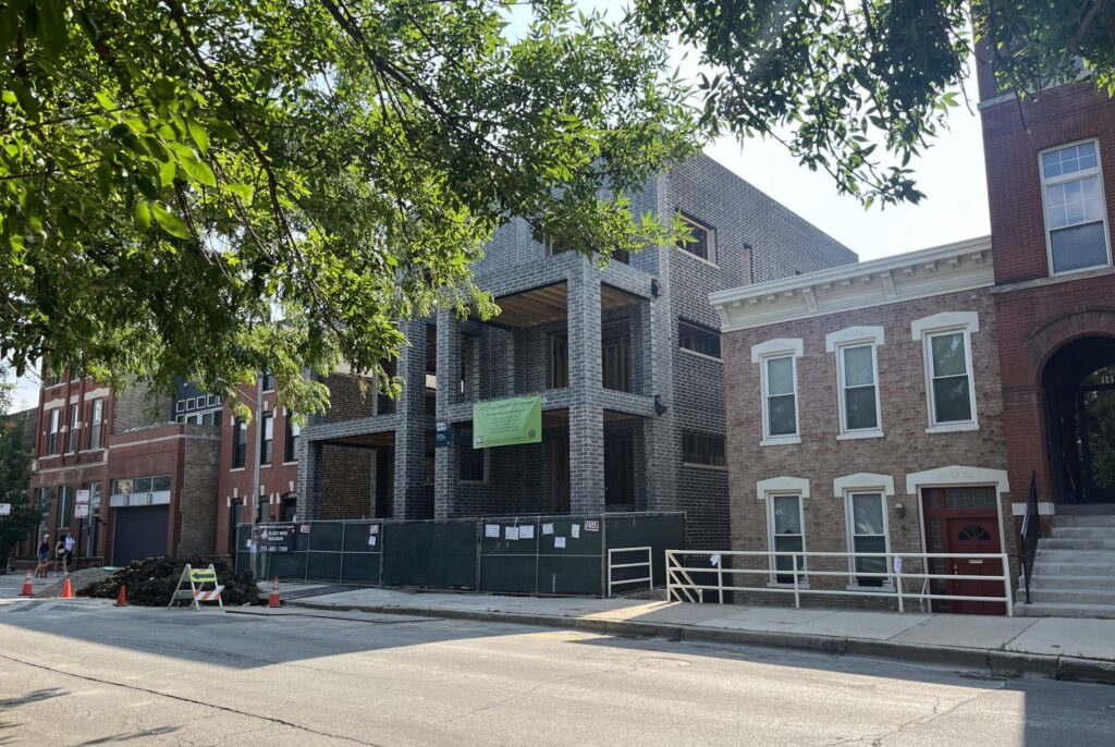 A residential duplex set for construction in Chicago. The 21st Century Road to Housing Act is being hailed for allowing municipalities to do more, such as construct affordable housing, with federal grant money. (Photo by Robbie Sequeira/Stateline)