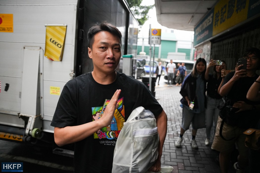 Former district councillor Jimmy Sham arrives at his home in Jordan at around 6.26am on May 30, 2025, after being released from prison. Photo: Kyle Lam/HKFP.
